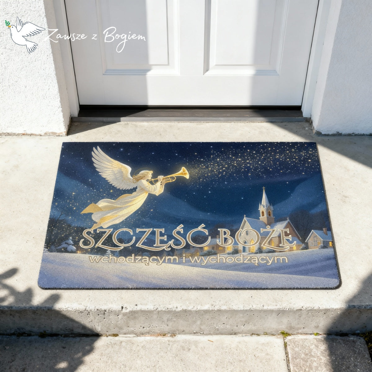 „Szczęść Boże wchodzącym i wychodzącym” – wycieraczka z aniołem nad zimowym miasteczkiem